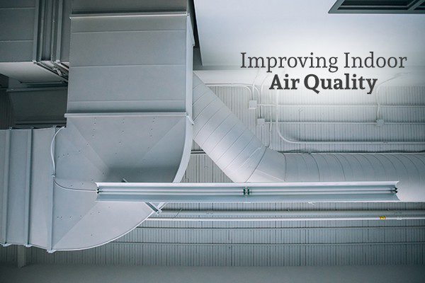 Air ducts on the ceiling with the words improving indoor air quality